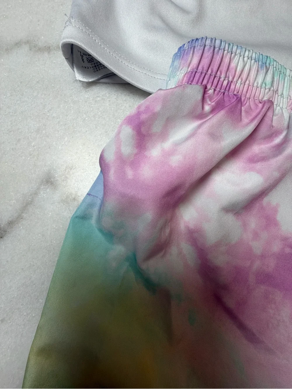 Nike White Dri-FIT Top with Pastel Rainbow Tie-Dye Waistband